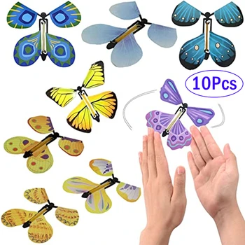 Magischer Wind-Up-fliegender Schmetterling im Buch, Gummiband-betriebenes magisches Feen-fliegendes Spielzeug
