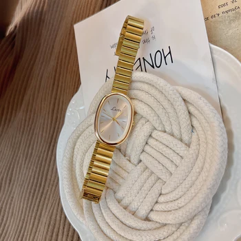 Modische Damenuhr mit goldenem Armband, Vintage- und Luxus-Ins-Stil, elegante und vielseitige Quarzuhr