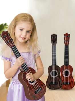 Spielzeug-Ukulele, klassisches Gitarren-Musikinstrument, Kinder spielen frühes pädagogisches Lernen