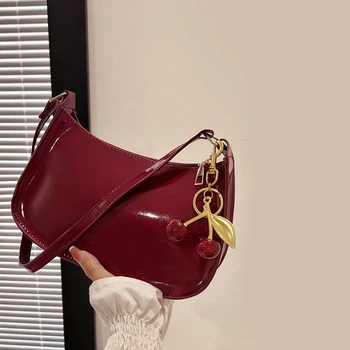 Damen-Handtasche aus PU-Leder, vielseitige, modische, einfarbige Schultertasche mit Kirschanhänger, lässige