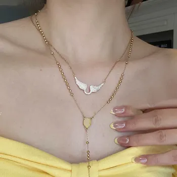 Exquisite Luxuriöse Glänzende Zirkonbesetzte Goldfarbene Engelsflügel-Anhänger-Halskette für Damen